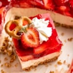 This Strawberry Pretzel Salad features a buttery pretzel crust, creamy filling, and fruity Jello topping — perfect for summer parties and potlucks! | aheadofthyme.com