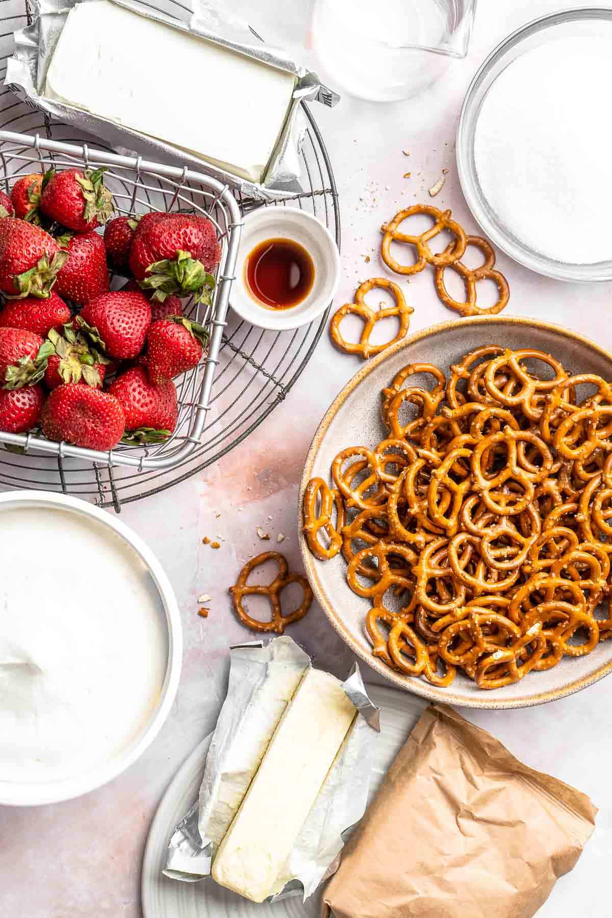 This Strawberry Pretzel Salad features a buttery pretzel crust, creamy filling, and fruity Jello topping — perfect for summer parties and potlucks! | aheadofthyme.com