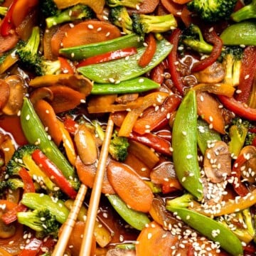 Easy Vegetable Stir Fry is a quick and healthy dinner made with vibrant veggies and a savory sauce. Ready in 20 minutes and perfect for weeknights! | aheadofthyme.com