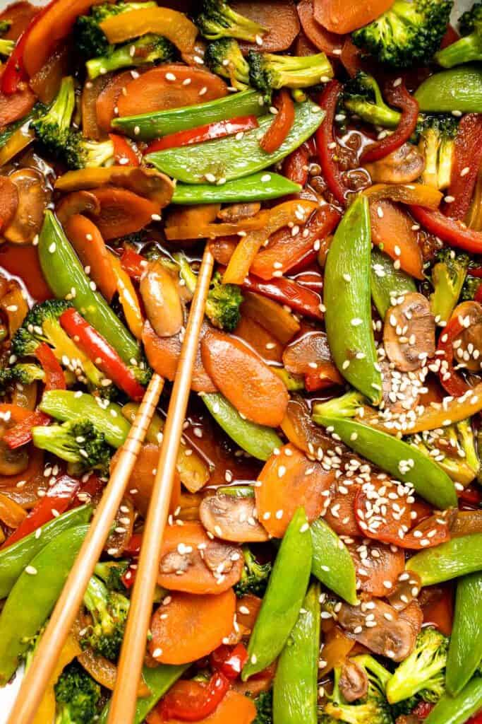 Easy Vegetable Stir Fry is a quick and healthy dinner made with vibrant veggies and a savory sauce. Ready in 20 minutes and perfect for weeknights! | aheadofthyme.com