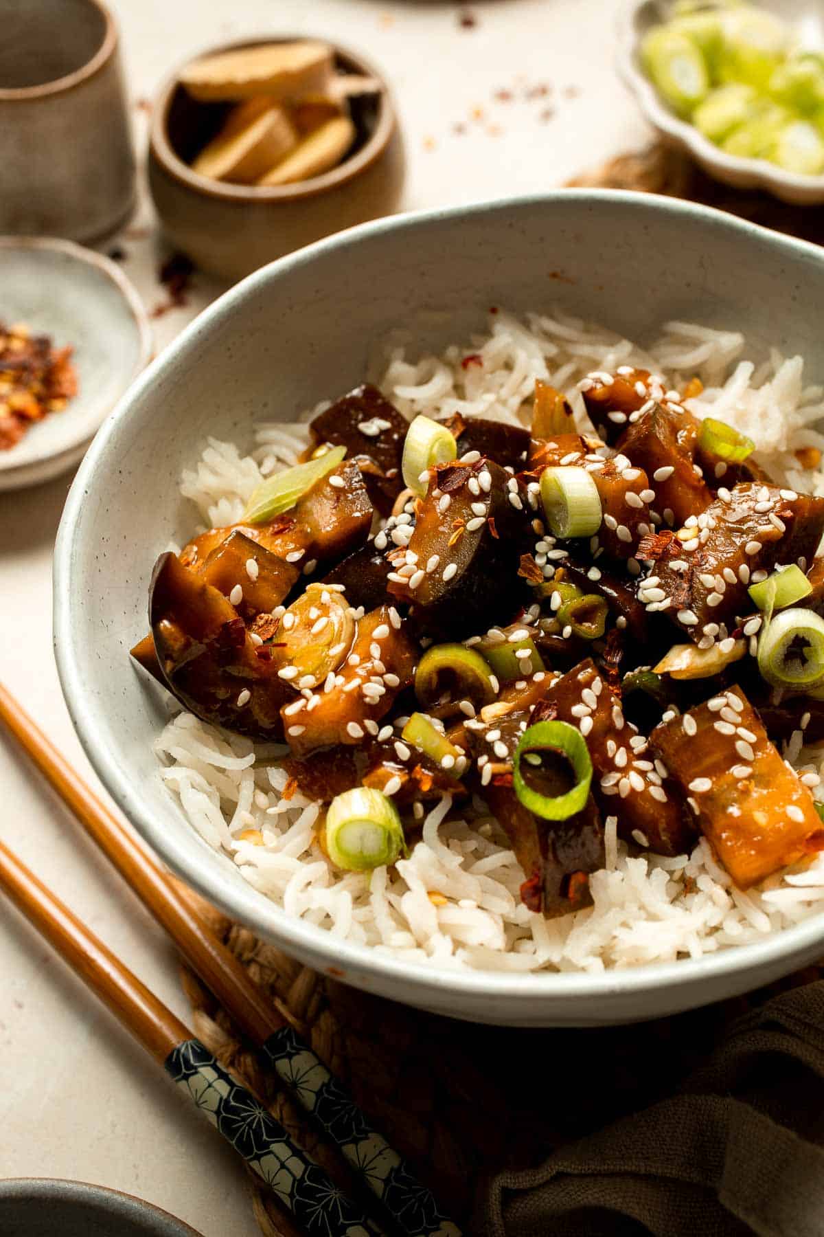 Quick and flavorful, this Chinese Eggplant Stir Fry is packed with garlic, ginger, and savory sauce. Perfect for rice or noodles! | aheadofthyme.com