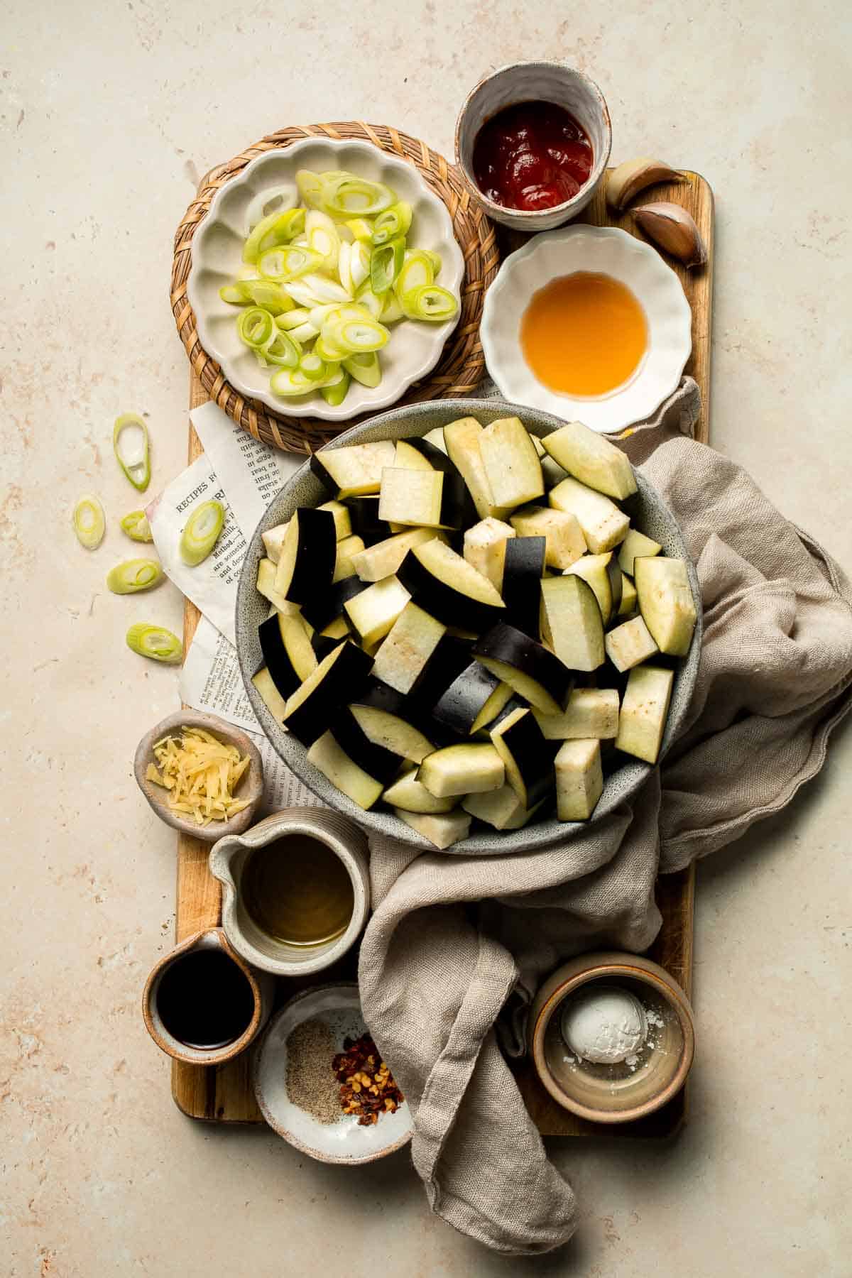 Quick and flavorful, this Chinese Eggplant Stir Fry is packed with garlic, ginger, and savory sauce. Perfect for rice or noodles! | aheadofthyme.com