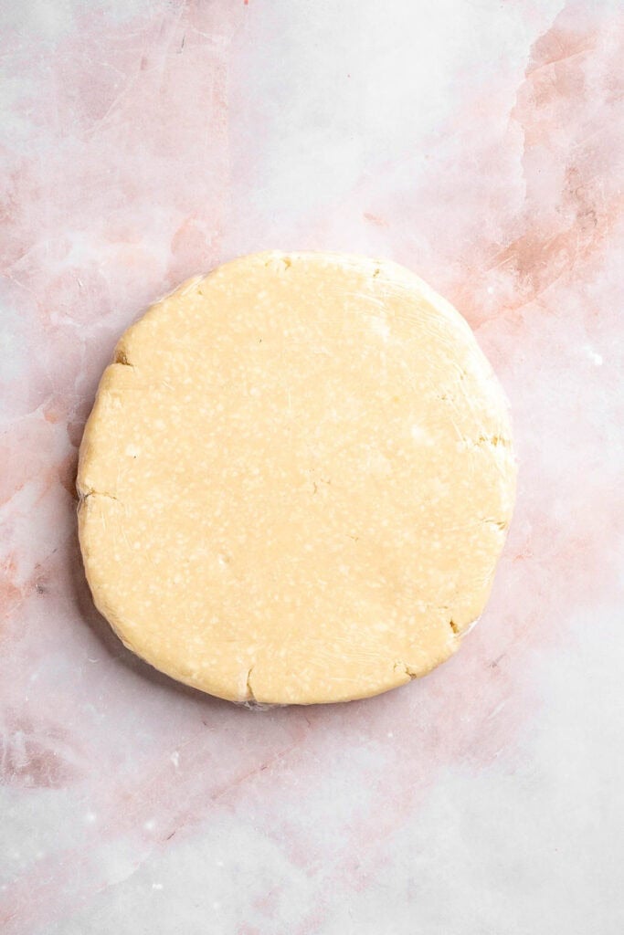 This French Lemon Tart features a crisp sable crust and silky lemon filling. It's perfectly tangy, smooth, and ideal for spring or summer gatherings. | aheadofthyme.com