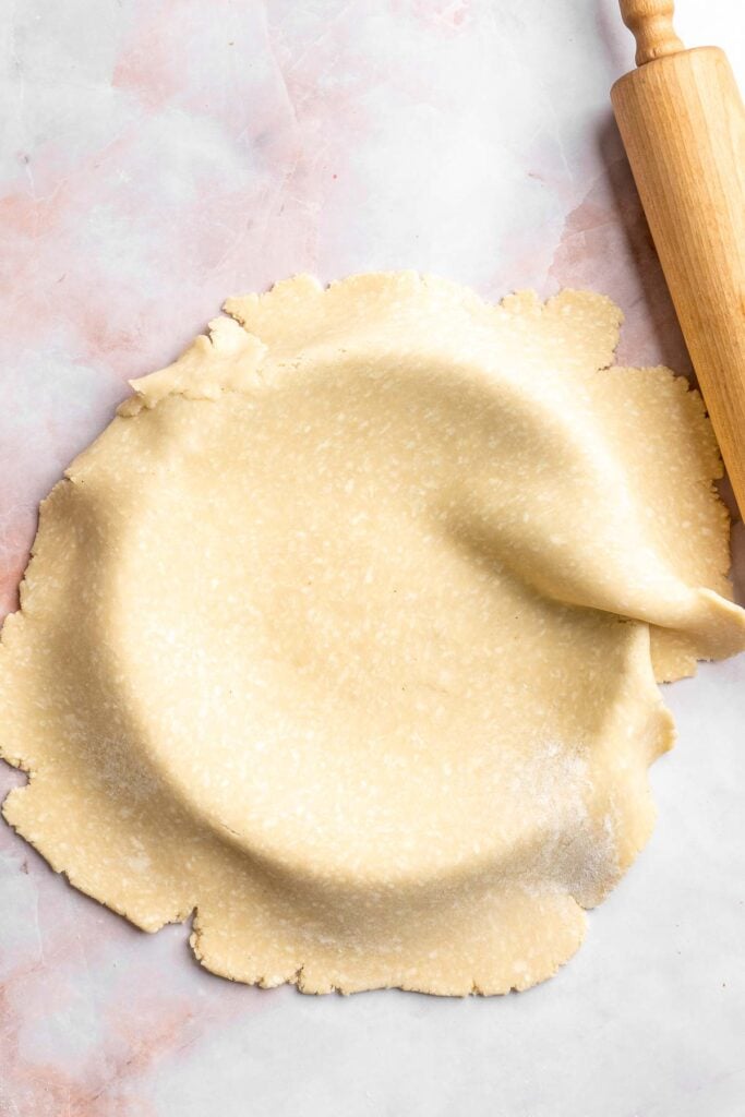 This French Lemon Tart features a crisp sable crust and silky lemon filling. It's perfectly tangy, smooth, and ideal for spring or summer gatherings. | aheadofthyme.com