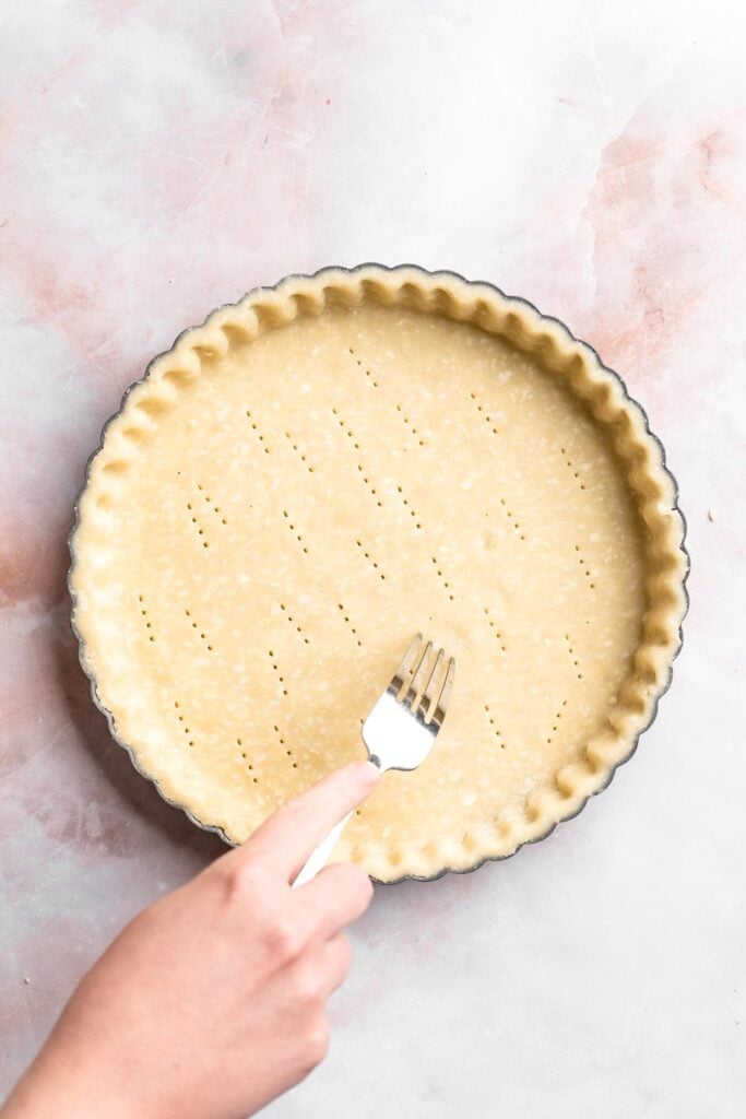 This French Lemon Tart features a crisp sable crust and silky lemon filling. It's perfectly tangy, smooth, and ideal for spring or summer gatherings. | aheadofthyme.com