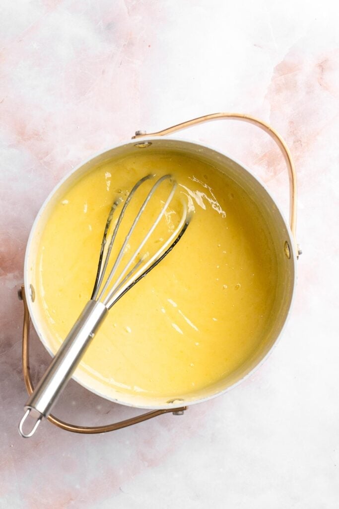 This French Lemon Tart features a crisp sable crust and silky lemon filling. It's perfectly tangy, smooth, and ideal for spring or summer gatherings. | aheadofthyme.com