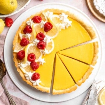 This French Lemon Tart features a crisp sable crust and silky lemon filling. It's perfectly tangy, smooth, and ideal for spring or summer gatherings. | aheadofthyme.com