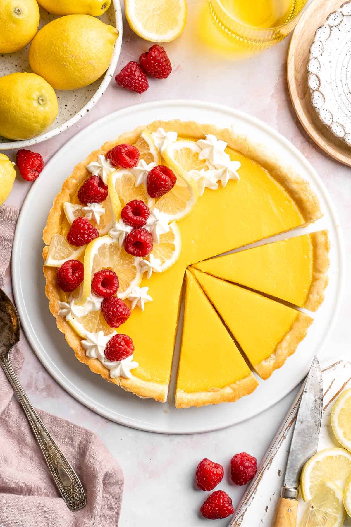 This French Lemon Tart features a crisp sable crust and silky lemon filling. It's perfectly tangy, smooth, and ideal for spring or summer gatherings. | aheadofthyme.com