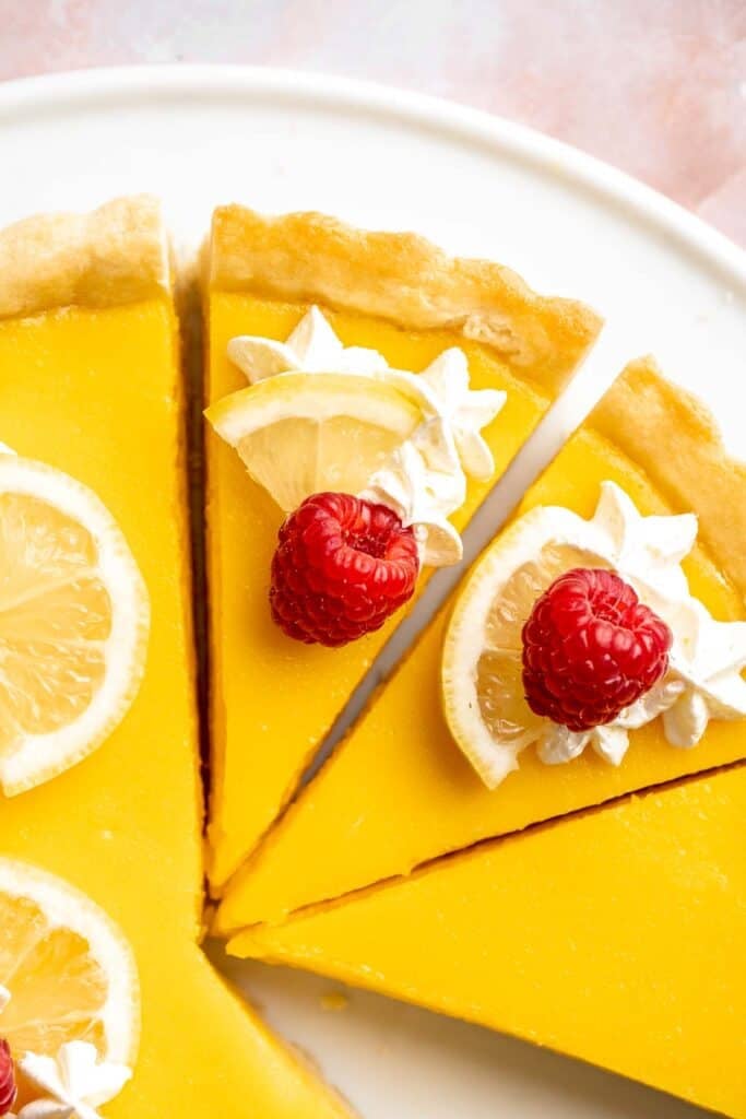This French Lemon Tart features a crisp sable crust and silky lemon filling. It's perfectly tangy, smooth, and ideal for spring or summer gatherings. | aheadofthyme.com