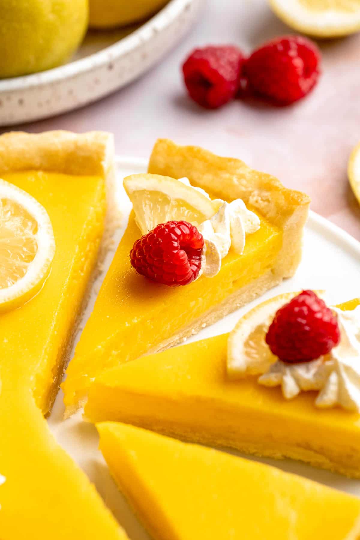 This French Lemon Tart features a crisp sable crust and silky lemon filling. It's perfectly tangy, smooth, and ideal for spring or summer gatherings. | aheadofthyme.com
