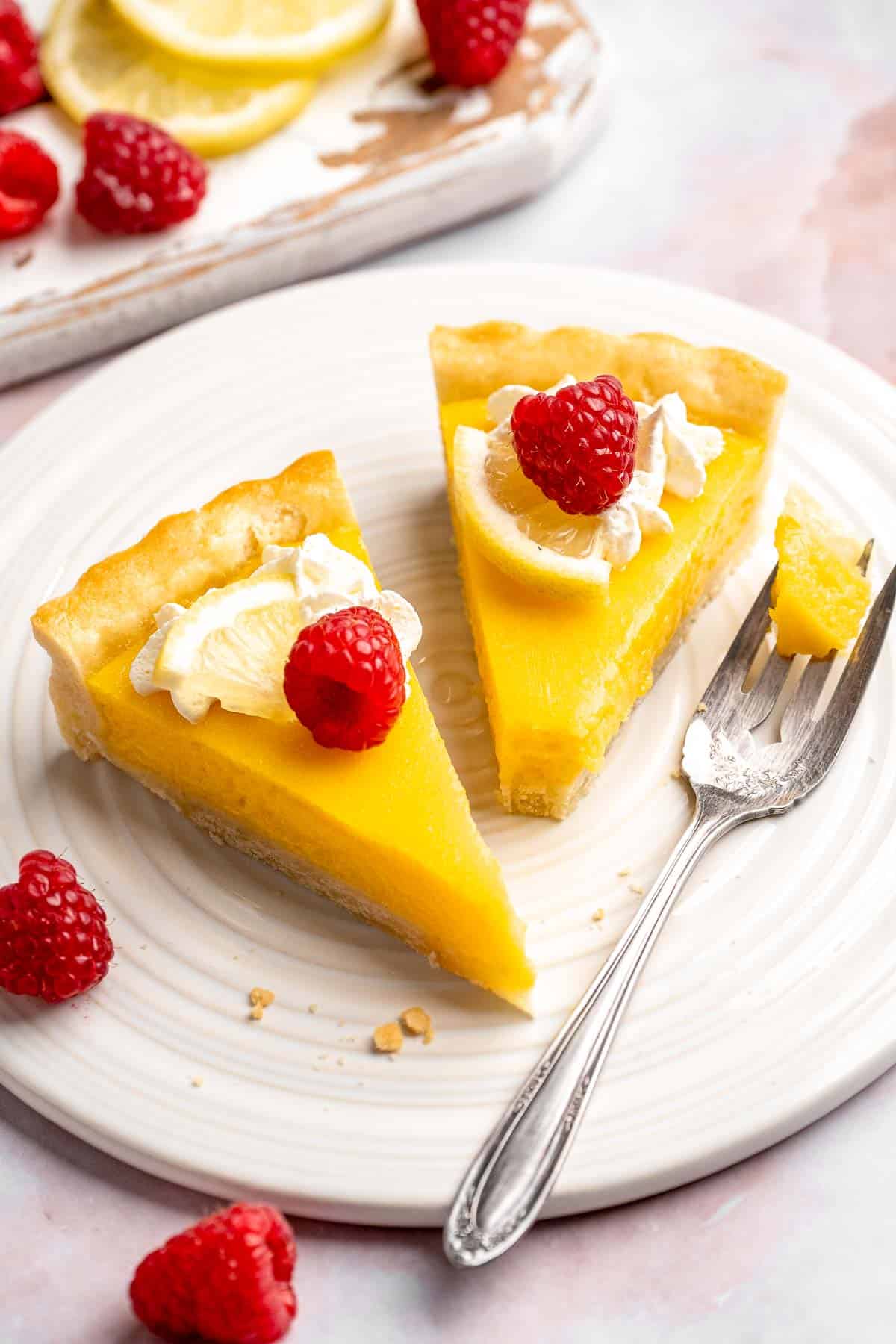 This French Lemon Tart features a crisp sable crust and silky lemon filling. It's perfectly tangy, smooth, and ideal for spring or summer gatherings. | aheadofthyme.com