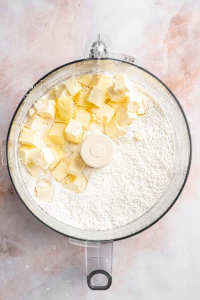 This French Lemon Tart features a crisp sable crust and silky lemon filling. It's perfectly tangy, smooth, and ideal for spring or summer gatherings. | aheadofthyme.com