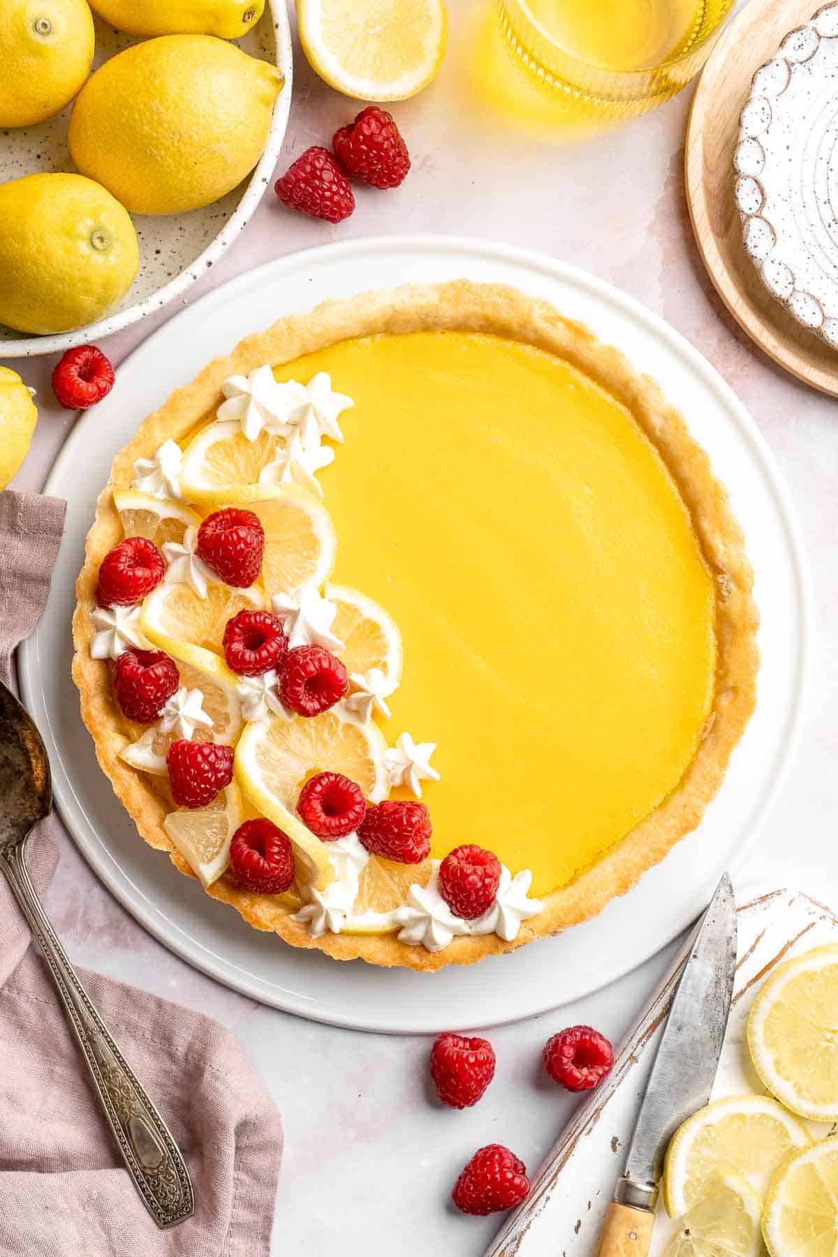 This French Lemon Tart features a crisp sable crust and silky lemon filling. It's perfectly tangy, smooth, and ideal for spring or summer gatherings. | aheadofthyme.com