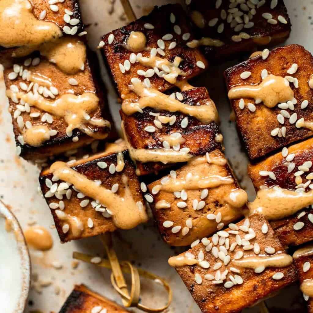 Looking for a delicious and protein-packed vegan meal? Try these grilled tofu skewers, perfect for a summer BBQ or any time of year. | aheadofthyme.com