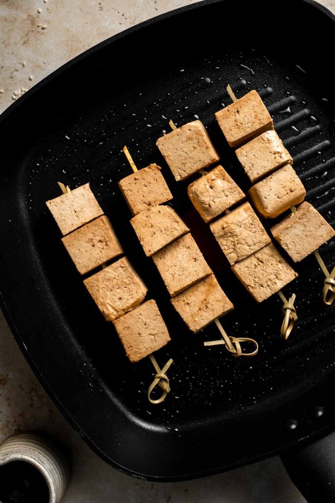 Looking for a delicious and protein-packed vegan meal? Try these grilled tofu skewers, perfect for a summer BBQ or any time of year. | aheadofthyme.com