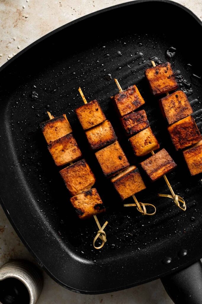 Looking for a delicious and protein-packed vegan meal? Try these grilled tofu skewers, perfect for a summer BBQ or any time of year. | aheadofthyme.com
