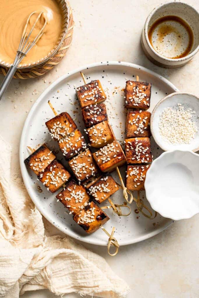 Looking for a delicious and protein-packed vegan meal? Try these grilled tofu skewers, perfect for a summer BBQ or any time of year. | aheadofthyme.com