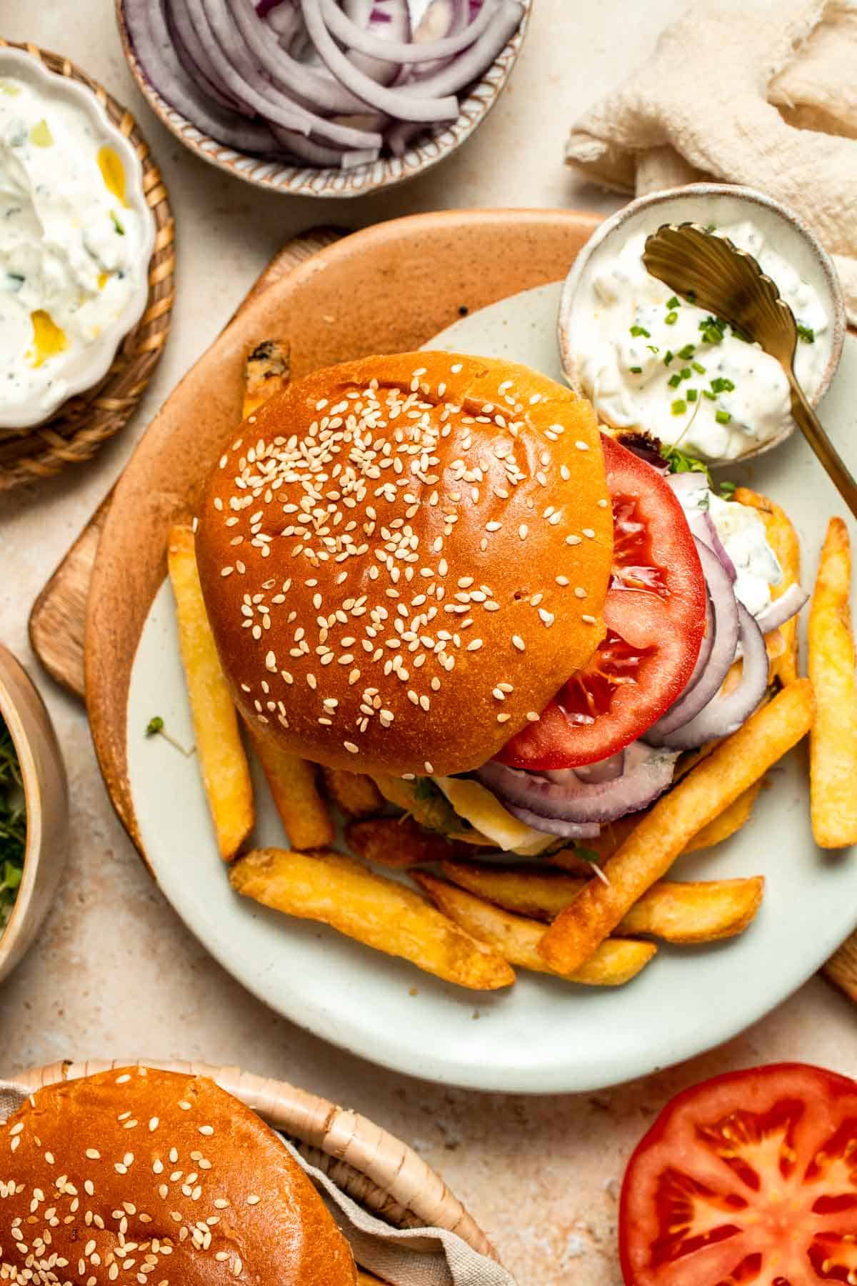 Halloumi Burgers are crispy, salty, and packed with Mediterranean flavor. A quick and easy vegetarian burger ready in 15 minutes! | aheadofthyme.com