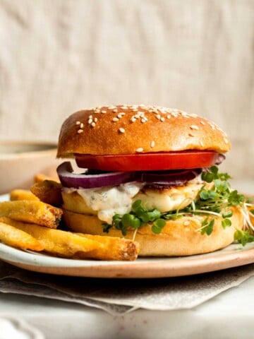 Halloumi Burgers are crispy, salty, and packed with Mediterranean flavor. A quick and easy vegetarian burger ready in 15 minutes! | aheadofthyme.com