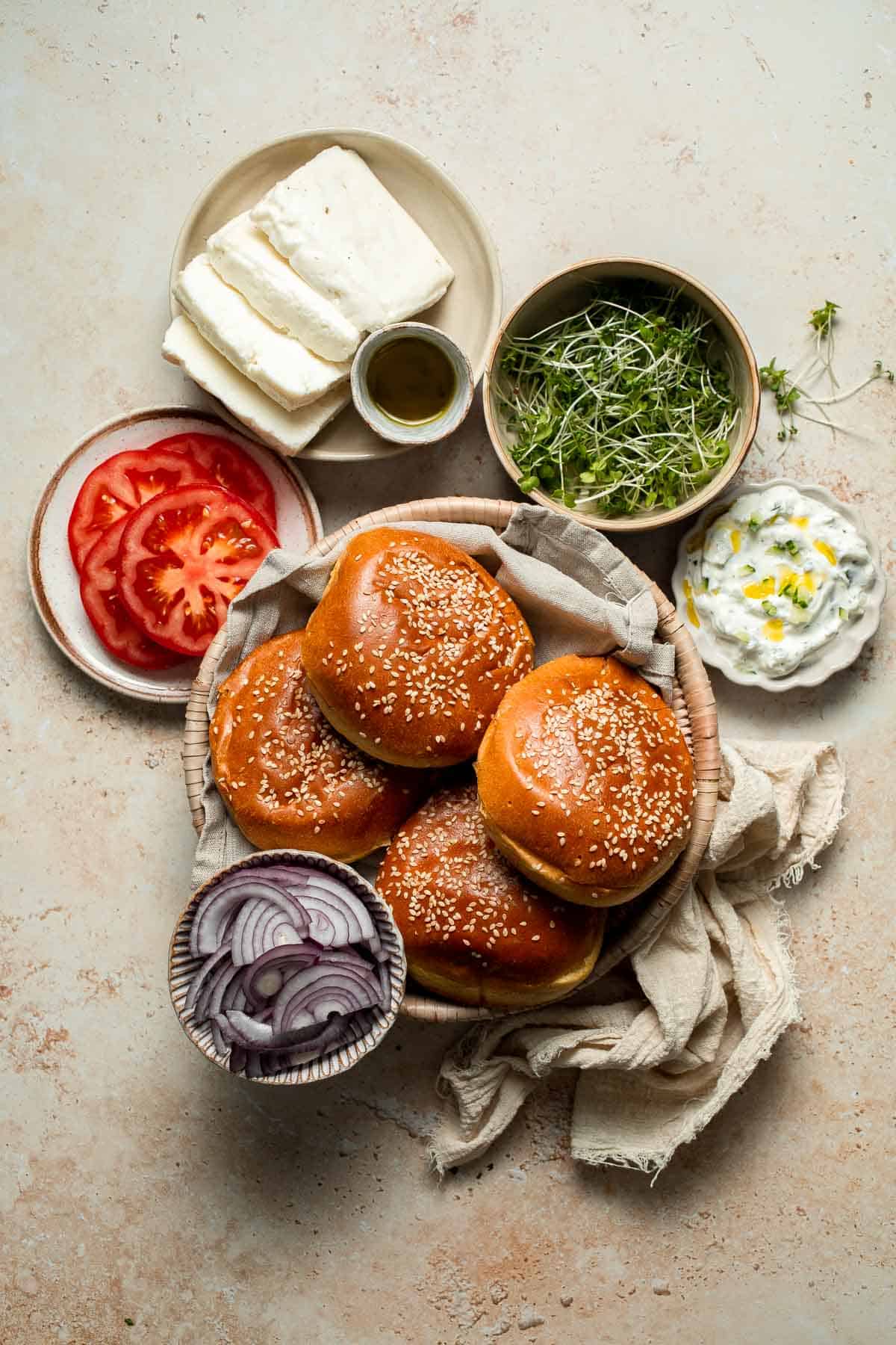 Halloumi Burgers are crispy, salty, and packed with Mediterranean flavor. A quick and easy vegetarian burger ready in 15 minutes! | aheadofthyme.com
