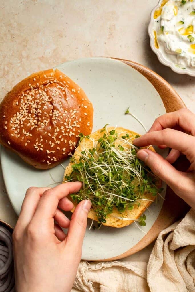 Halloumi Burgers are crispy, salty, and packed with Mediterranean flavor. A quick and easy vegetarian burger ready in 15 minutes! | aheadofthyme.com