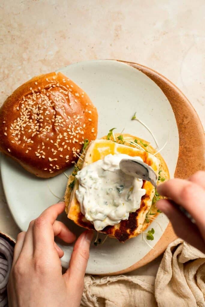 Halloumi Burgers are crispy, salty, and packed with Mediterranean flavor. A quick and easy vegetarian burger ready in 15 minutes! | aheadofthyme.com