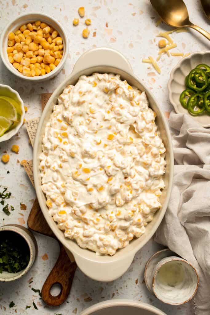 This creamy Mexican Street Corn Dip (Elote Dip) is packed with bold, tangy flavor and ready in just 25 minutes. Perfect for parties! | aheadofthyme.com