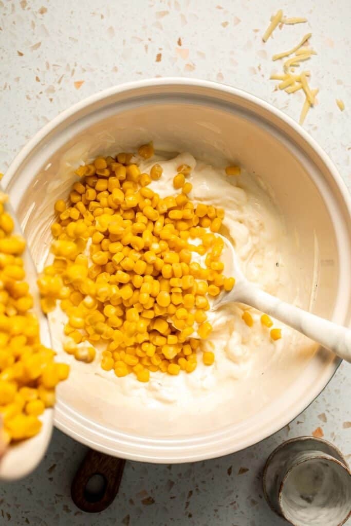 This creamy Mexican Street Corn Dip (Elote Dip) is packed with bold, tangy flavor and ready in just 25 minutes. Perfect for parties! | aheadofthyme.com
