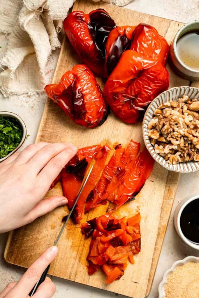 Muhammara is a delicious Middle Eastern dip made with roasted red peppers, walnuts, and spices. Perfect for dipping or spreading on sandwiches. | aheadofthyme.com