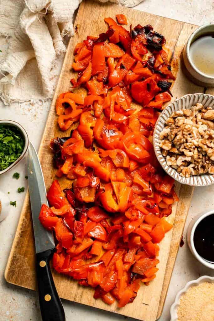 Muhammara is a delicious Middle Eastern dip made with roasted red peppers, walnuts, and spices. Perfect for dipping or spreading on sandwiches. | aheadofthyme.com