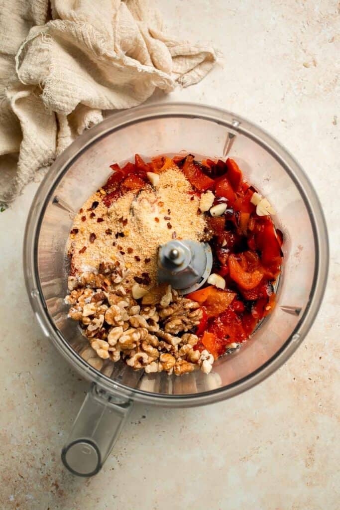Muhammara is a delicious Middle Eastern dip made with roasted red peppers, walnuts, and spices. Perfect for dipping or spreading on sandwiches. | aheadofthyme.com