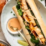 This flavorful Vegetarian Banh Mi Sandwich is made with crispy tofu, pickled vegetables, and sweet mayo layered inside a crusty baguette. | aheadofthyme.com