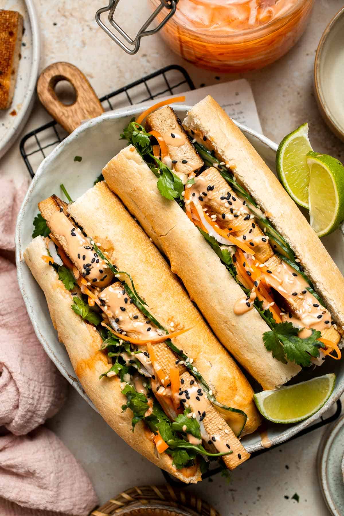 This flavorful Vegetarian Banh Mi Sandwich is made with crispy tofu, pickled vegetables, and sweet mayo layered inside a crusty baguette. | aheadofthyme.com