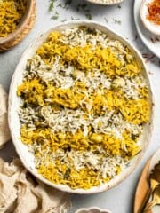 Baghali Polo is a traditional Persian dish made with fragrant basmati rice, dill, and tender fava beans. Learn how to make it with our easy recipe. | aheadofthyme.com