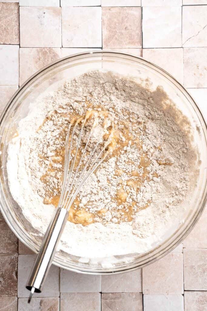 Indulge in the flavors of fall with these delicious baked apple cider donuts coated in spiced cinnamon sugar. An easy to make and cozy fall treat! | aheadofthyme.com