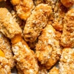 These delicious baked cheddar cheese sticks are the best snack or appetizer: crispy on the outside and gooey on the inside. Perfect for cheese lovers! | aheadofthyme.com