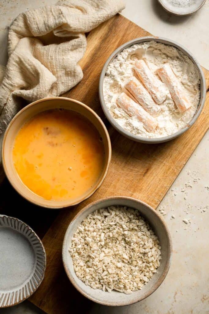 These delicious baked cheddar cheese sticks are the best snack or appetizer: crispy on the outside and gooey on the inside. Perfect for cheese lovers! | aheadofthyme.com