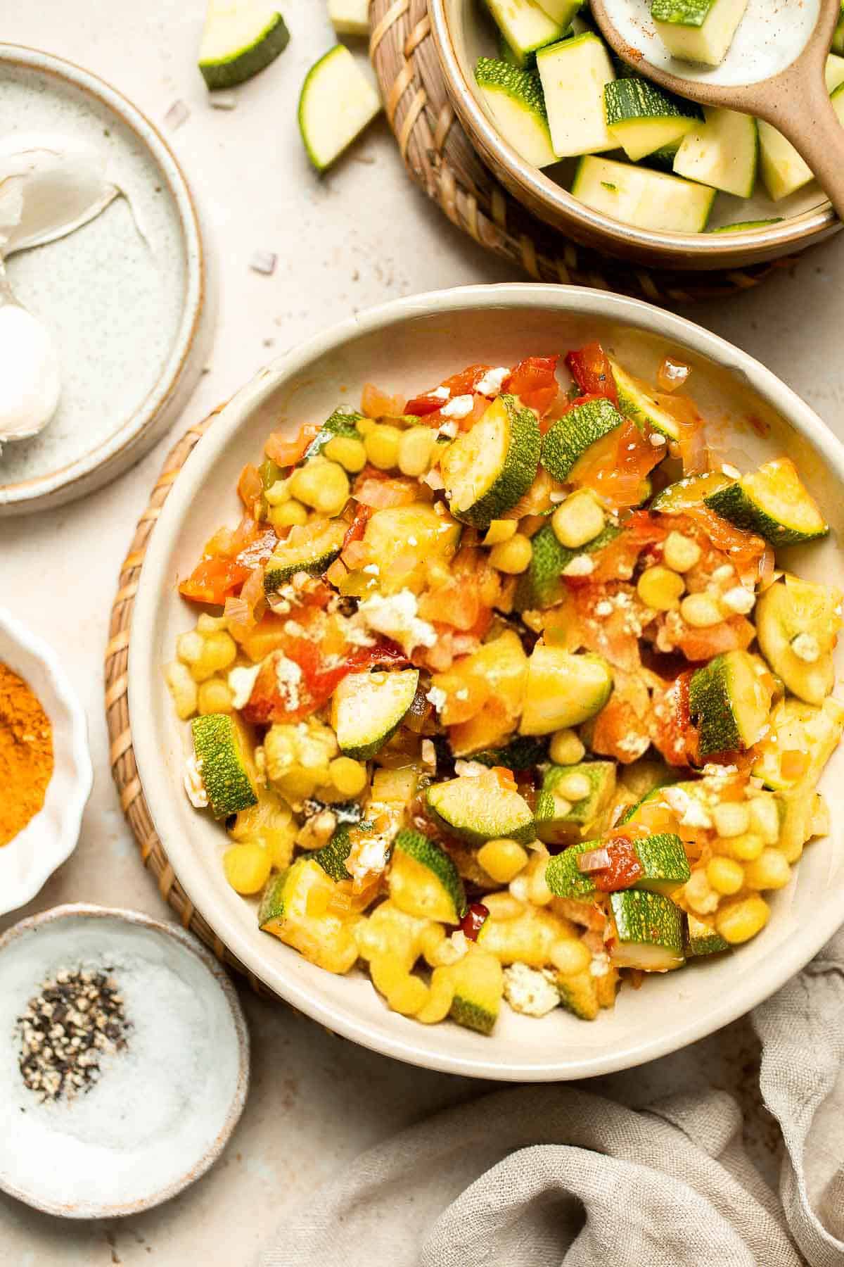 Calabacitas (Mexican Zucchini) is a traditional side dish made with zucchini, corn, tomatoes, and peppers. Make these colorful veggies in just 20 minutes. | aheadofthyme.com