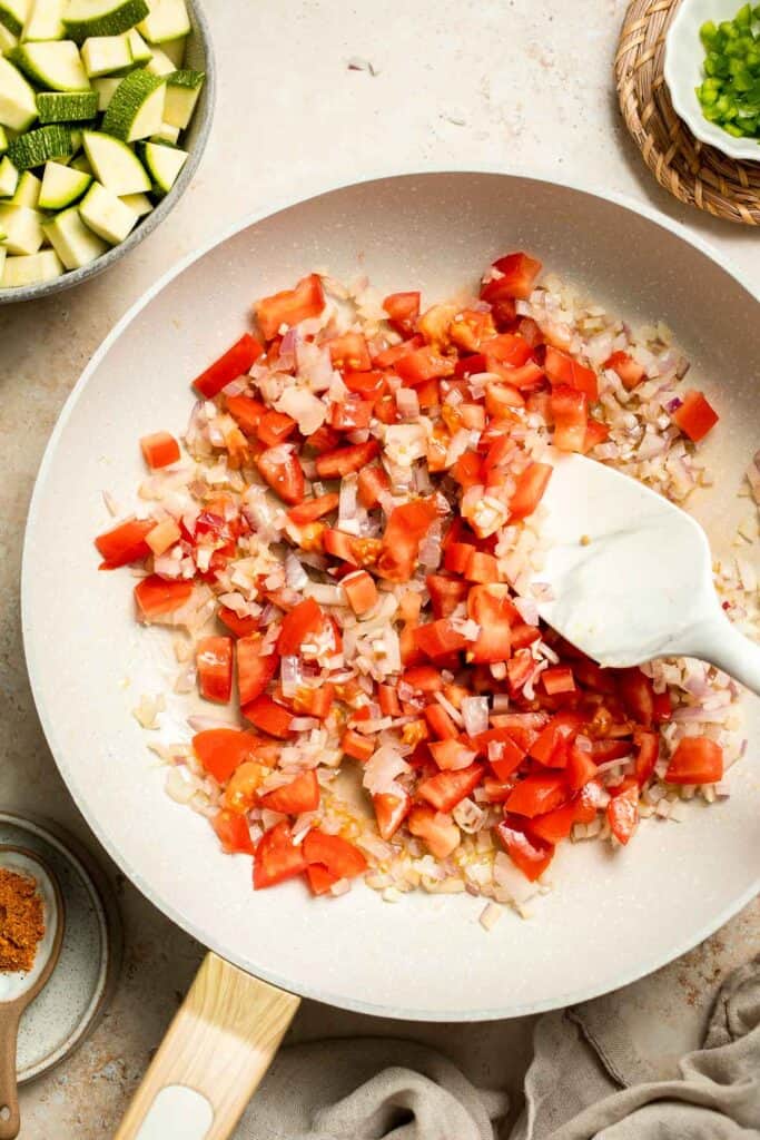 Calabacitas (Mexican Zucchini) is a traditional side dish made with zucchini, corn, tomatoes, and peppers. Make these colorful veggies in just 20 minutes. | aheadofthyme.com