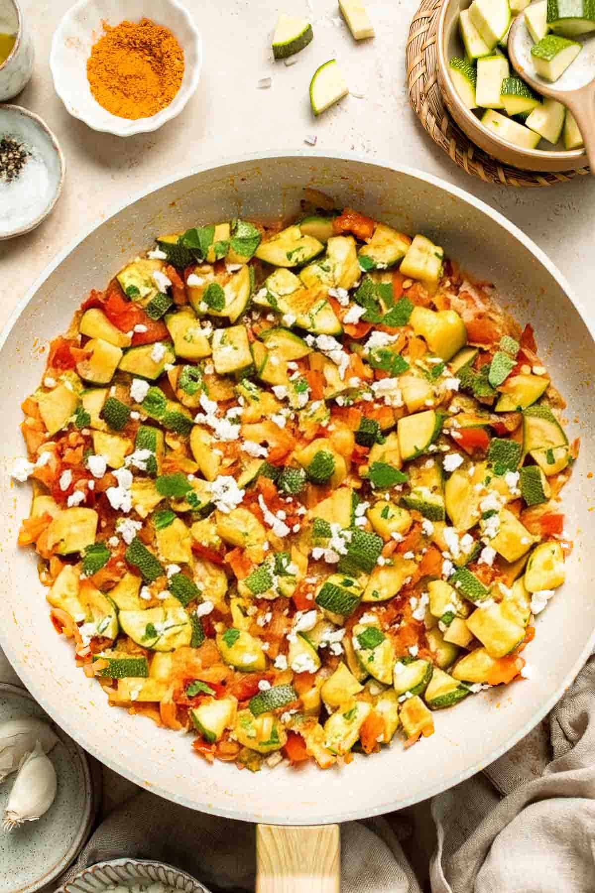 Calabacitas (Mexican Zucchini) is a traditional side dish made with zucchini, corn, tomatoes, and peppers. Make these colorful veggies in just 20 minutes. | aheadofthyme.com
