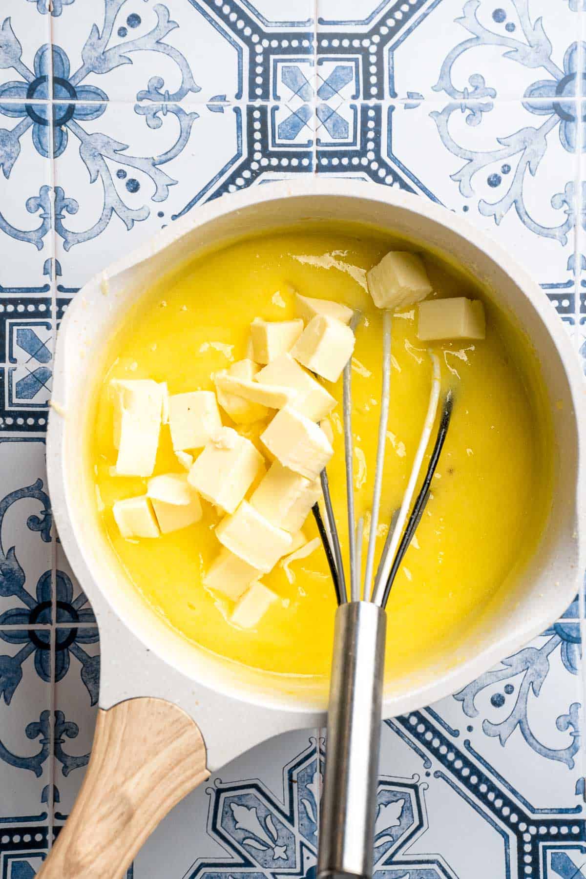 These Classic Lemon Bars with a buttery shortbread crust and tangy lemon curd layer are the perfect balance of sweet and tart. A simple, delicious treat! | aheadofthyme.com