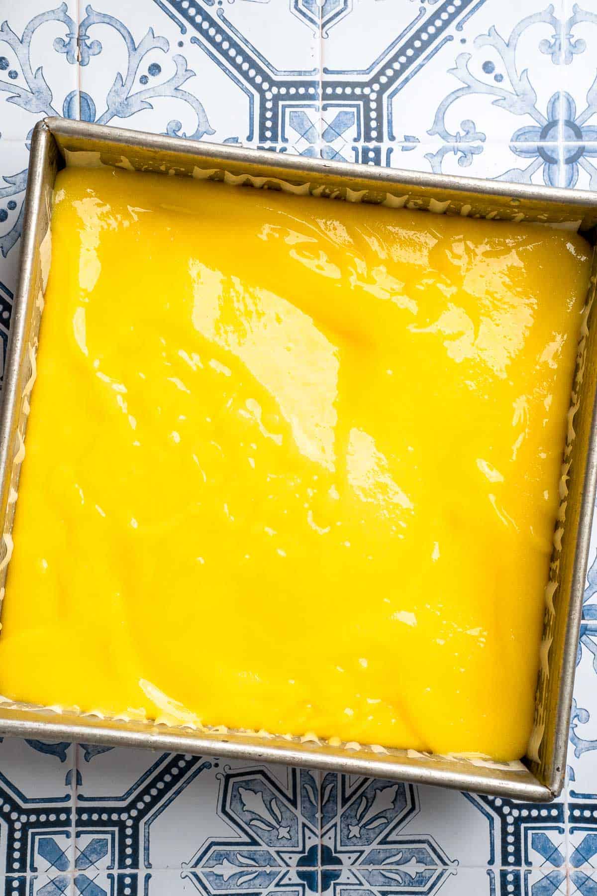These Classic Lemon Bars with a buttery shortbread crust and tangy lemon curd layer are the perfect balance of sweet and tart. A simple, delicious treat! | aheadofthyme.com
