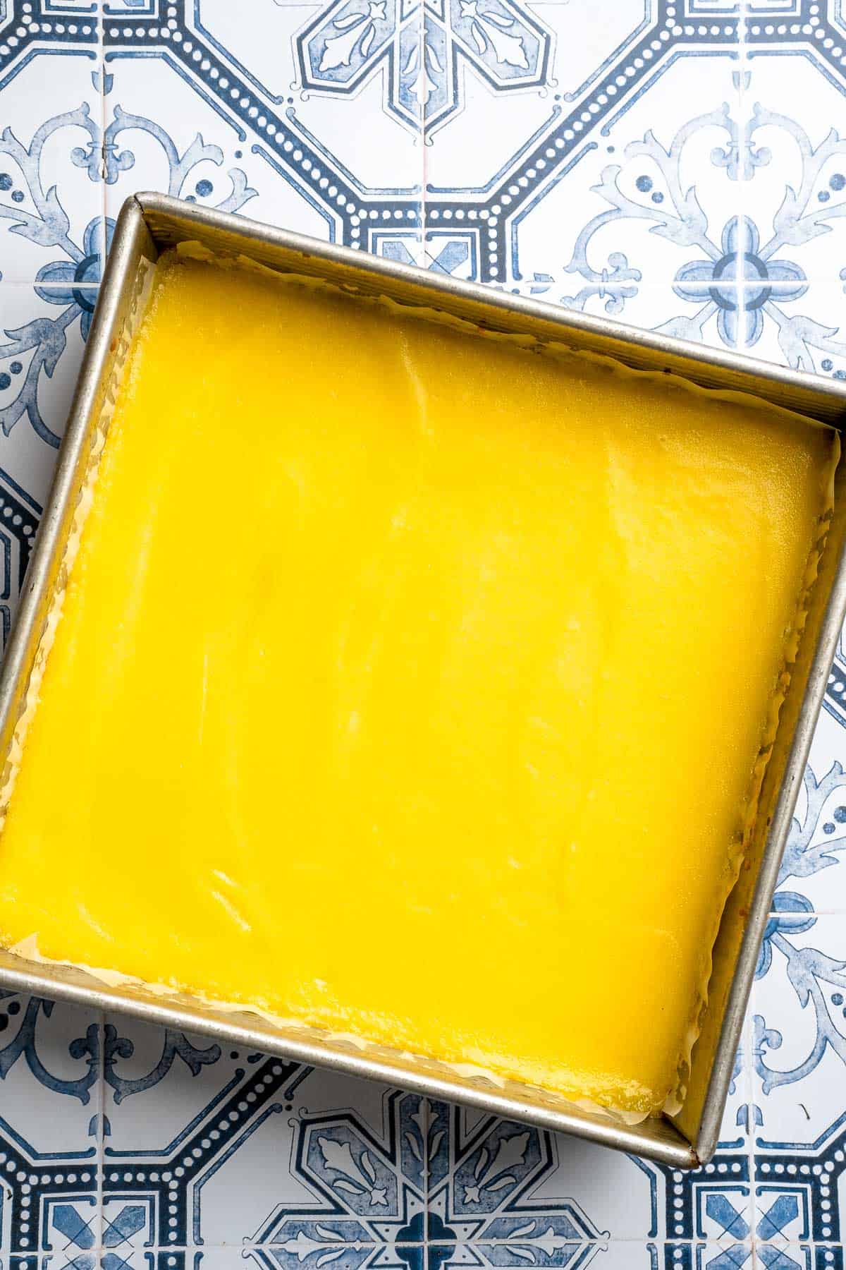 These Classic Lemon Bars with a buttery shortbread crust and tangy lemon curd layer are the perfect balance of sweet and tart. A simple, delicious treat! | aheadofthyme.com