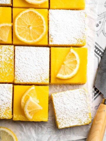 These Classic Lemon Bars with a buttery shortbread crust and tangy lemon curd layer are the perfect balance of sweet and tart. A simple, delicious treat! | aheadofthyme.com