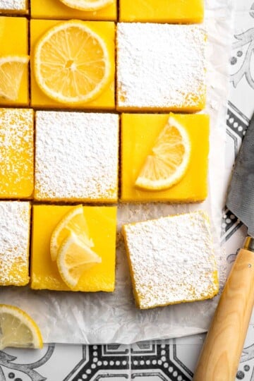 These Classic Lemon Bars with a buttery shortbread crust and tangy lemon curd layer are the perfect balance of sweet and tart. A simple, delicious treat! | aheadofthyme.com