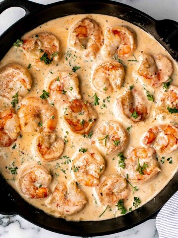Creamy Garlic Shrimp is a quick and easy 15-minute meal made with juicy shrimp in a cheesy garlic cream sauce. Perfect for weeknight dinners! | aheadofthyme.com