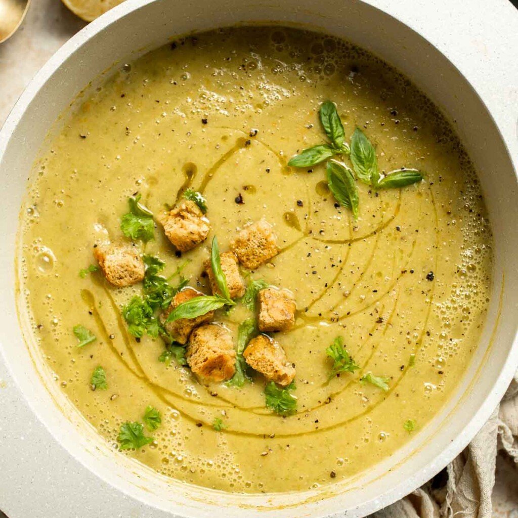 This Creamy Zucchini Soup is made without using cream (using secret ingredient white beans!). It's smooth, healthy, flavorful, vegan, and dairy-free. | aheadofthyme.com