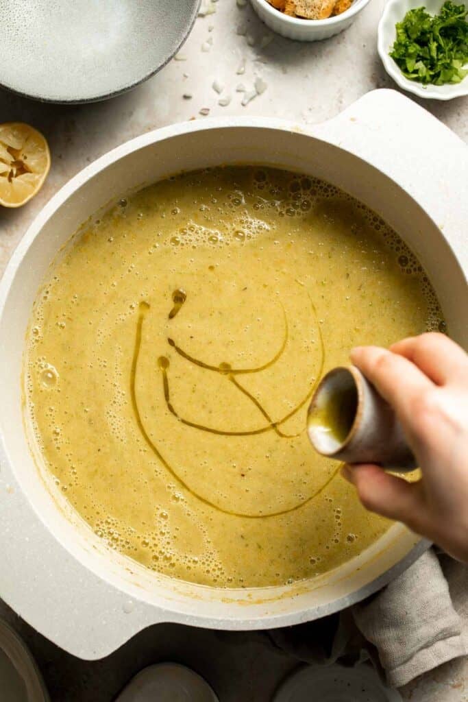 This Creamy Zucchini Soup is made without using cream (using secret ingredient white beans!). It's smooth, healthy, flavorful, vegan, and dairy-free. | aheadofthyme.com