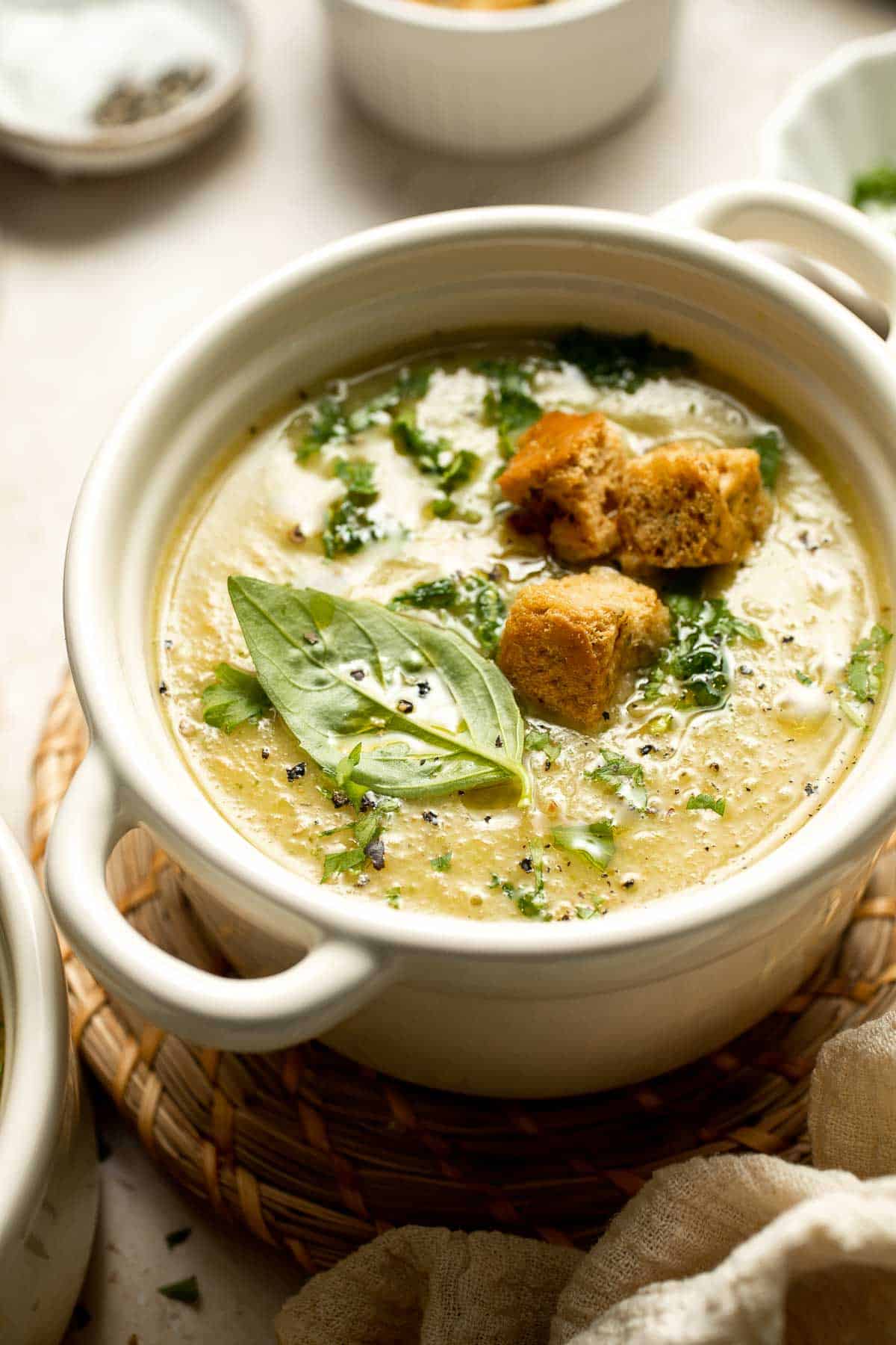This Creamy Zucchini Soup is made without using cream (using secret ingredient white beans!). It's smooth, healthy, flavorful, vegan, and dairy-free. | aheadofthyme.com
