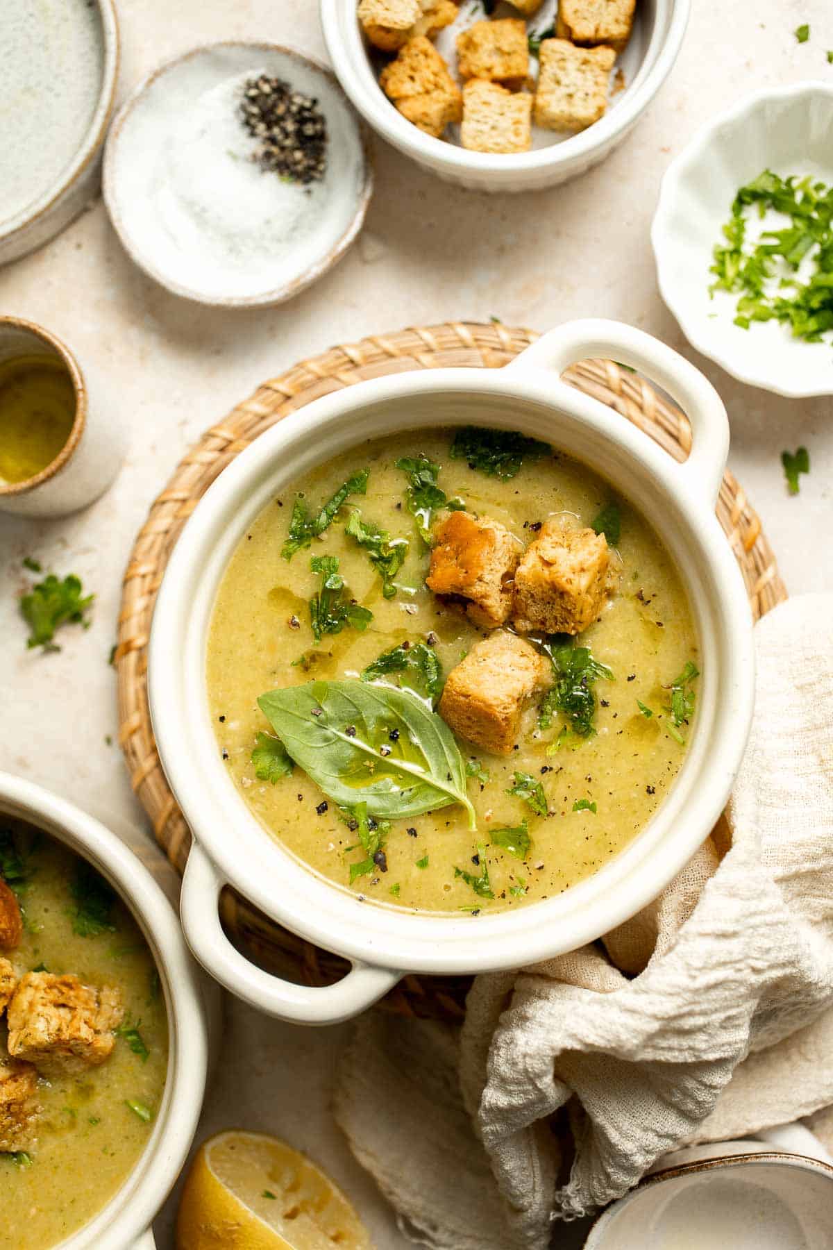 This Creamy Zucchini Soup is made without using cream (using secret ingredient white beans!). It's smooth, healthy, flavorful, vegan, and dairy-free. | aheadofthyme.com